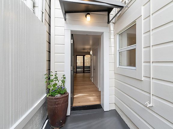 Front door off private entry courtyard