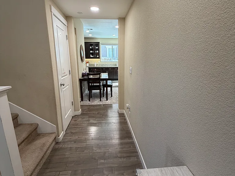 Entry way towards living room and kitchen