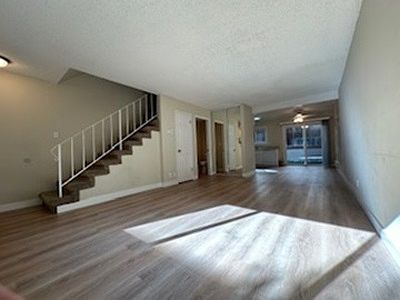 Other unit to show newly installed flooring downstairs!