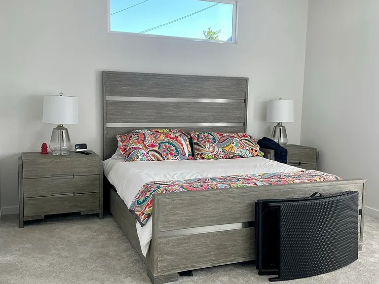 Large Primary suite with slider out to the Pool