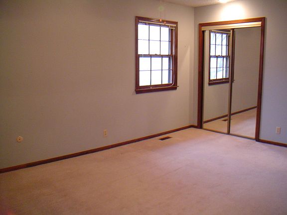Master Bedroom with 2 closets, one is a walk in