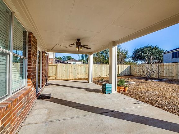 Imagine the possibilities with this after market covered back patio!
