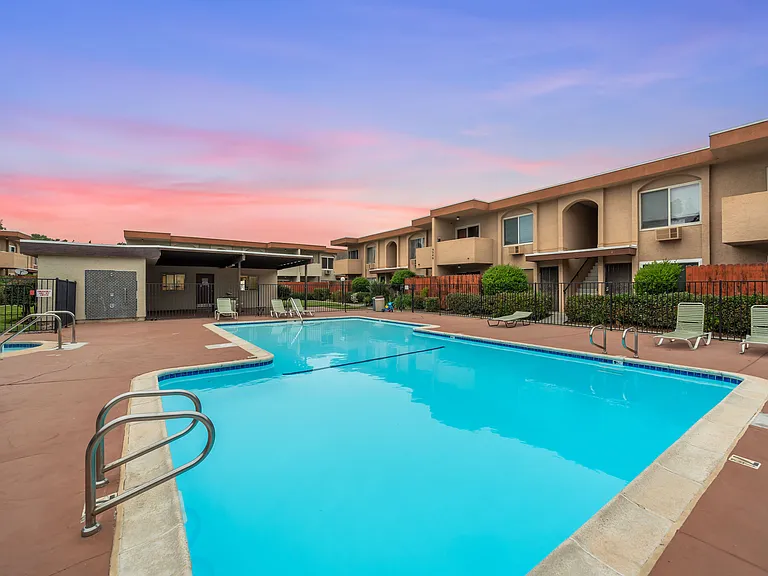 Relax, swim, and soak up the sun in the inviting pool area.