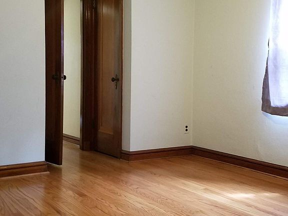 Bedroom with closet. Door leads to foyer.