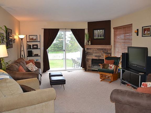 Living room has access to large backyard