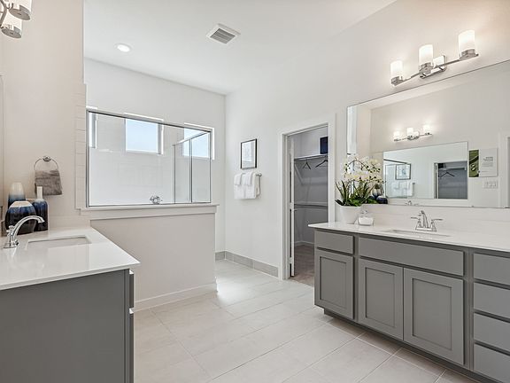 Primary Bathroom in the Van Gogh II home plan by Trophy Signature Homes - REPRESENTATIVE PHOTO