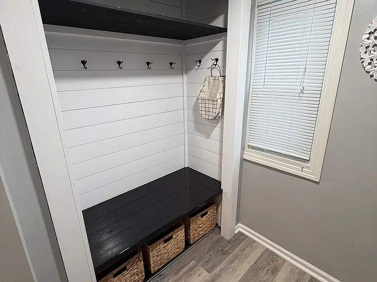 Front hallway, closet transformed into a mini mudroom type area