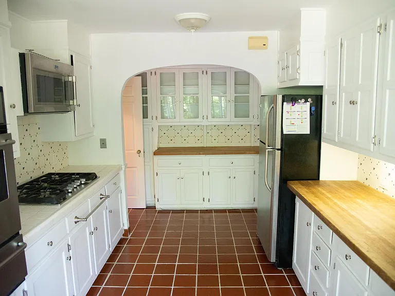 Kitchen view towards pantry
