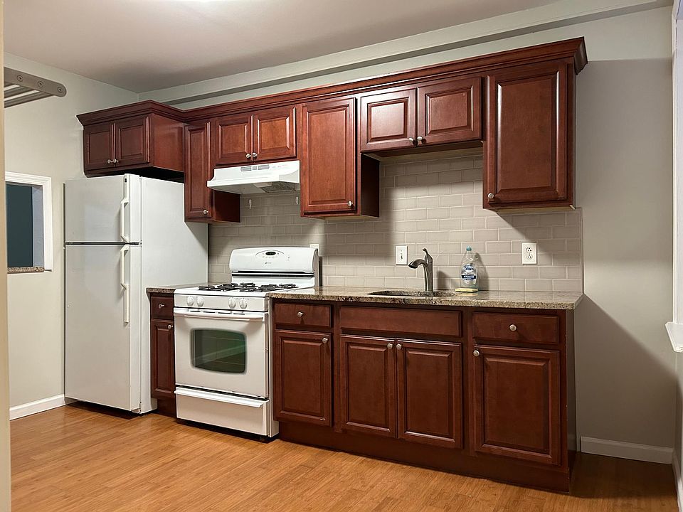 Kitchen with breakfast nook overlooking the living room