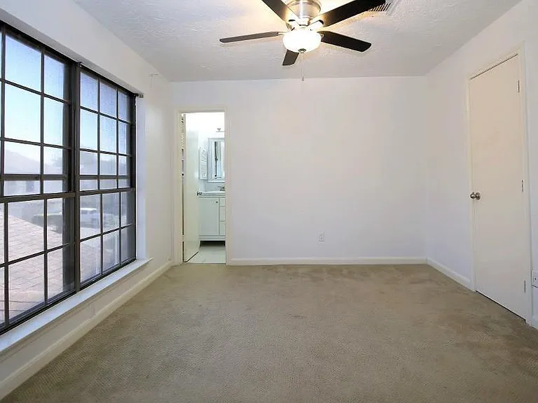Second bedroom. (Curtains installed)
