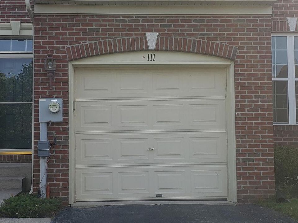 Garage and driveway.