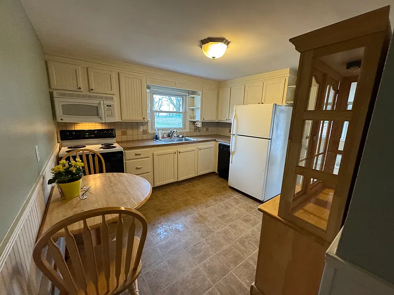Eat in kitchen- stove, microwave, refrigerator and dishwasher.
