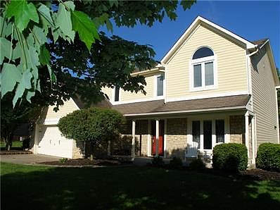 Great curb appeal with beautiful landscaping!