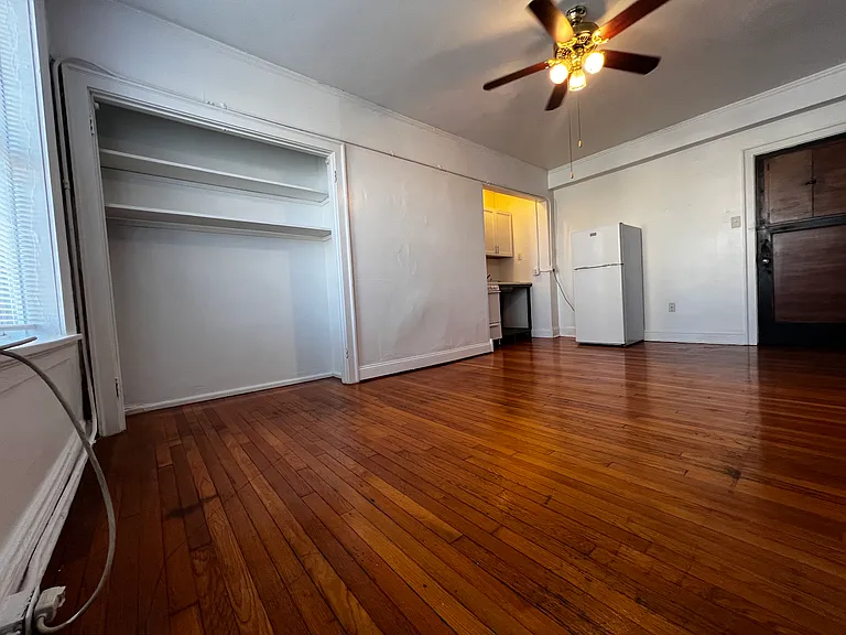 The efficient floor plan offers flexibility for both living and dining areas while maintaining a comfortable, open feel.