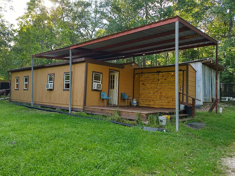 Laundry room with washer and dryer on the porch!