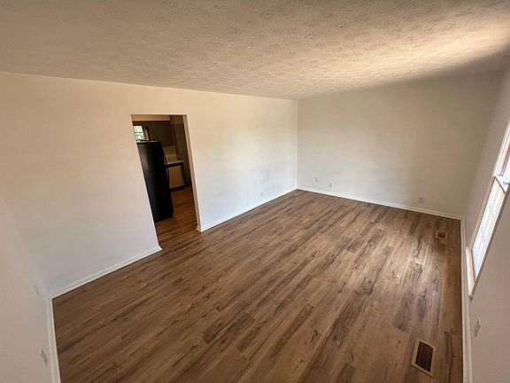 Living room leading into kitchen