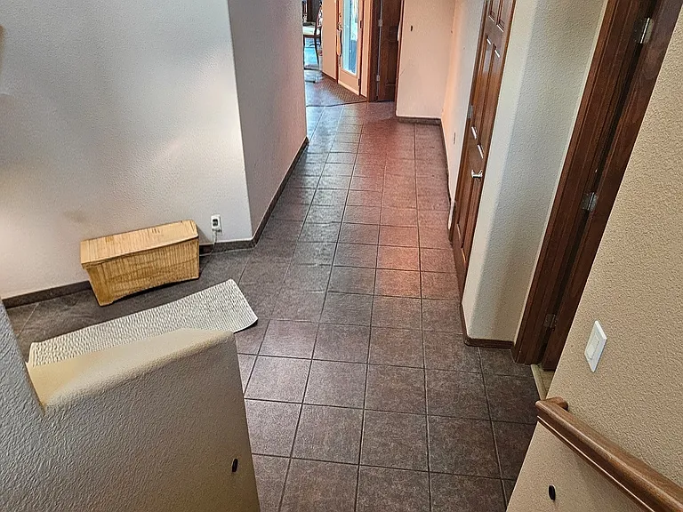 Hallway to the dining and living room area from the front door
