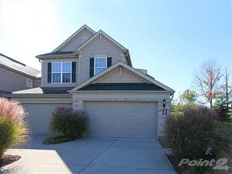 End unit with private entry and 2 car front entry garage.  Popular "Piermont" model.