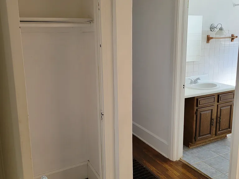 Hallway to closet, bathroom and bedrooms.