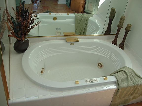 Master Bath has seperate vanities and his/hers walk-in closets