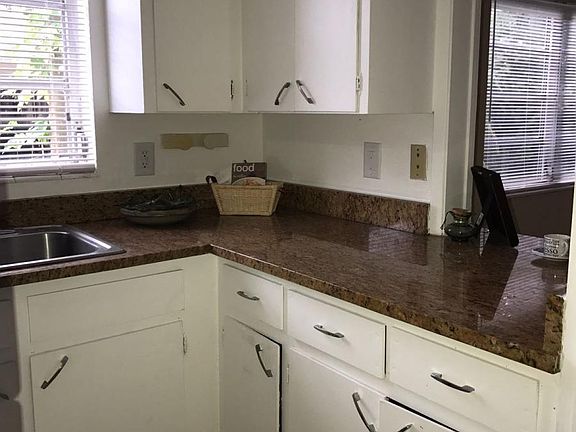 well lit kitchen and separate dining area