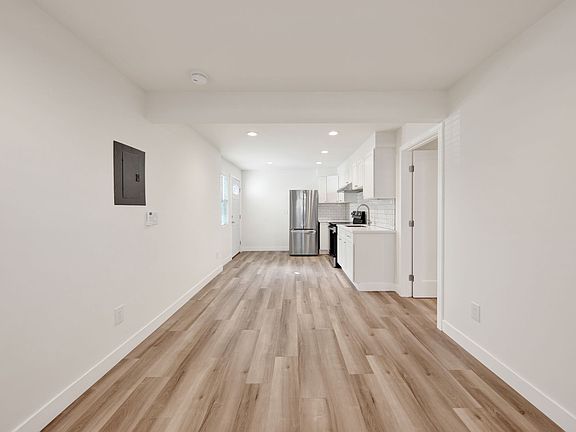 Family room, kitchen, and entrance
