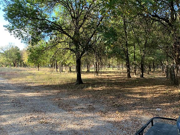 Just inside privacy gate.. road to house.