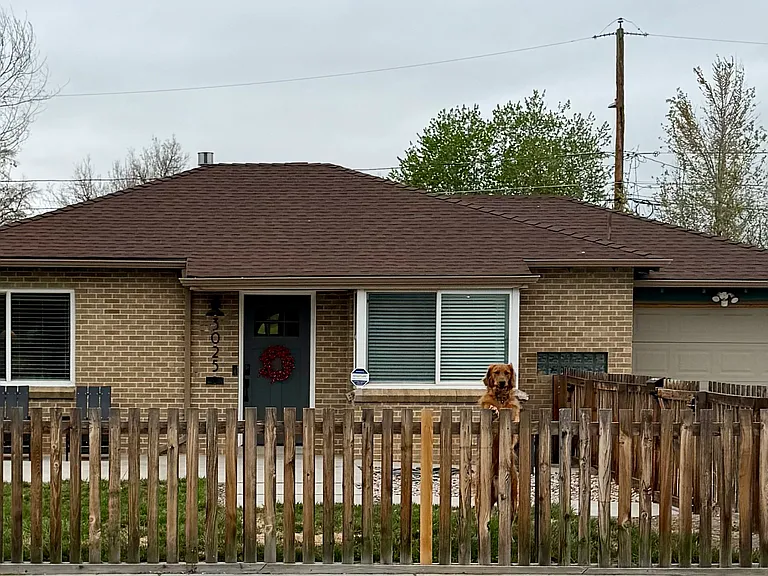 Fenced in front yard & patio.