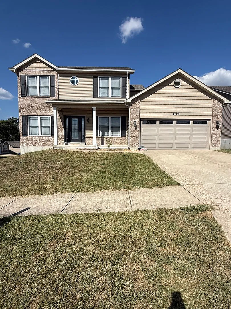 Spacious 5-Bedroom Home with Finished Basement Internet Included! — Photo 1