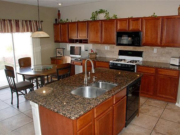 5th image of 10431 Rosefinch Dr NW