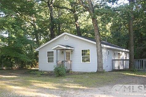 Front view of home with deck