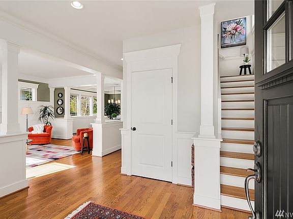 Welcome home. Gleaming wide-plank white oak floors grace the entry, staircase, and main floor.