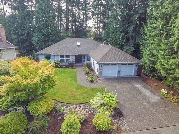 Front Yard with lawn and shrubs