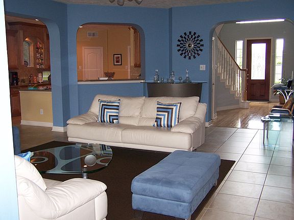 Living Room has builts ins and Tile Floor.