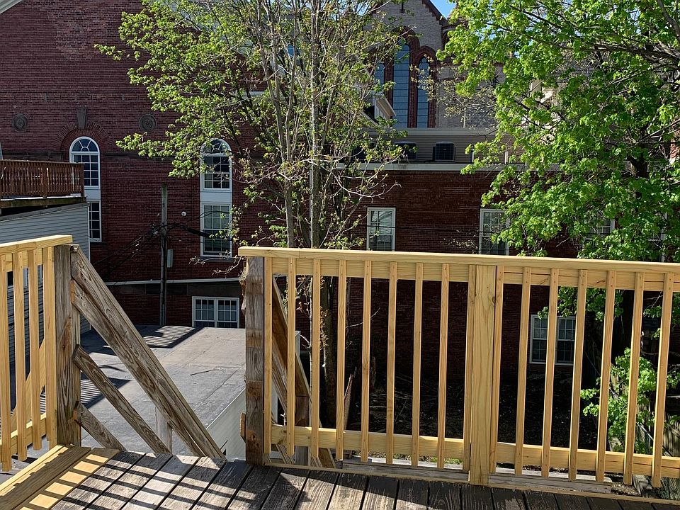 Private deck with stairs to fenced-in yard