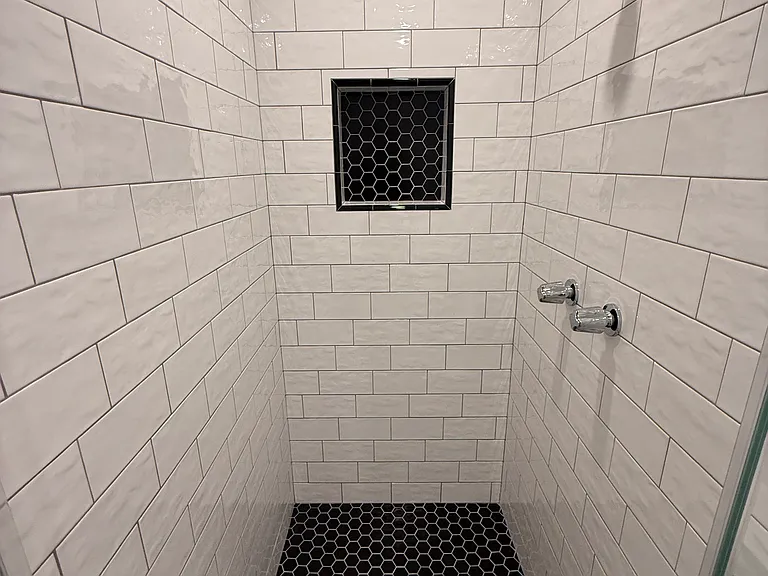 HUGE STALL SHOWER - WITH VINTAGE STYLE SUBWAY TILE ON WALL, HEXAGON TILE FLOOR AND SHAMPOO NICHE