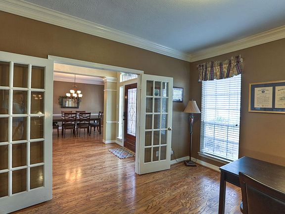 Pefect home office is bright and inviting. 15 lite french doors for added privacy.