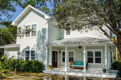 Your guests will feel welcomed upon arrival. Spacious front porch sitting area facing west. Easy circular driveway