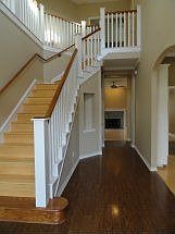 Hardwood, including bamboo, throughout the home.