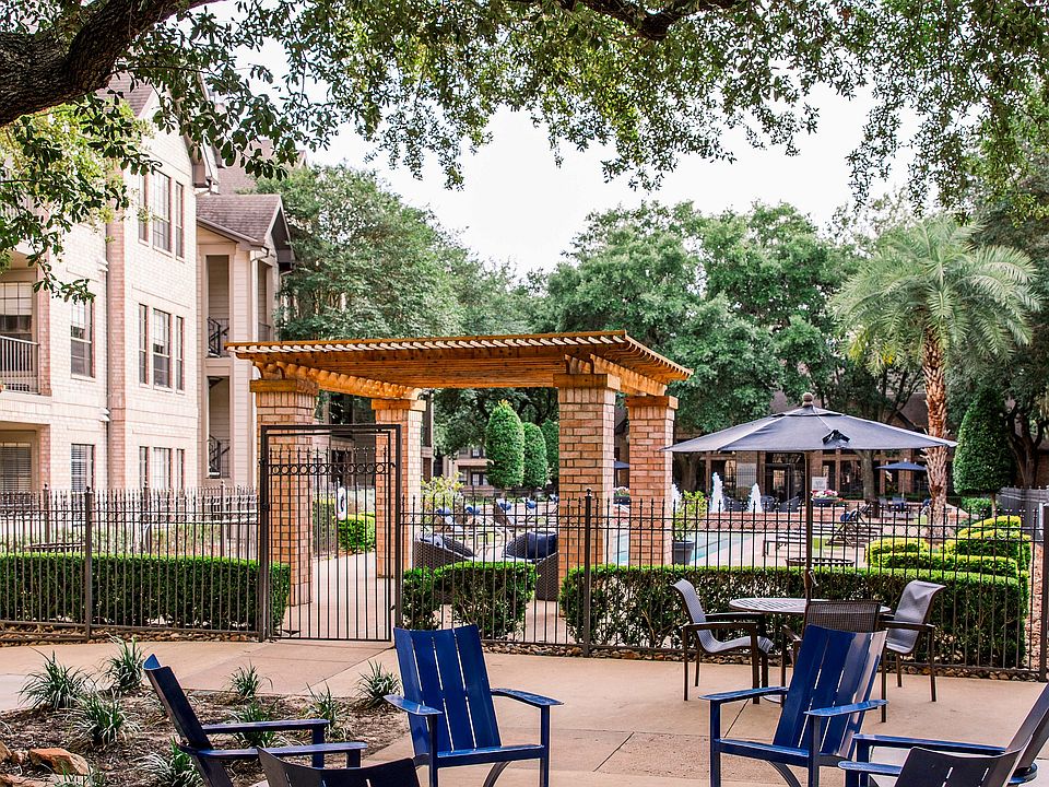 Relax while grilling with friends at this outdoor seating area under our massive live oak and crape myrtle trees.