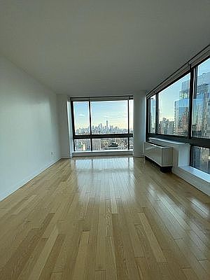 5th image of 9 W 31st St APT 23G