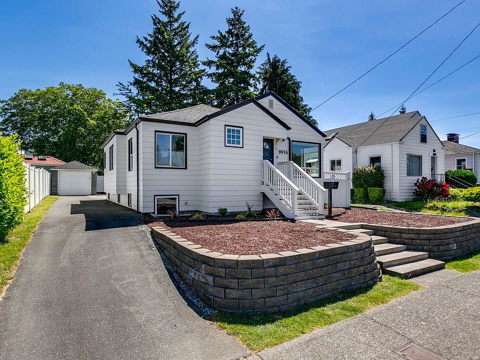 A classic mid-century Cape Cod style home, newly updated inside and out!
