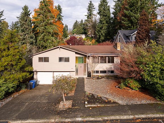 Newly renovated 1950's home on the edge of the Lake Hills Greenbelt, encompassing more than 150 acres of diverse wildlife habitat including forests, wetlands, streams and lakes, and over 2 miles of walking trails.