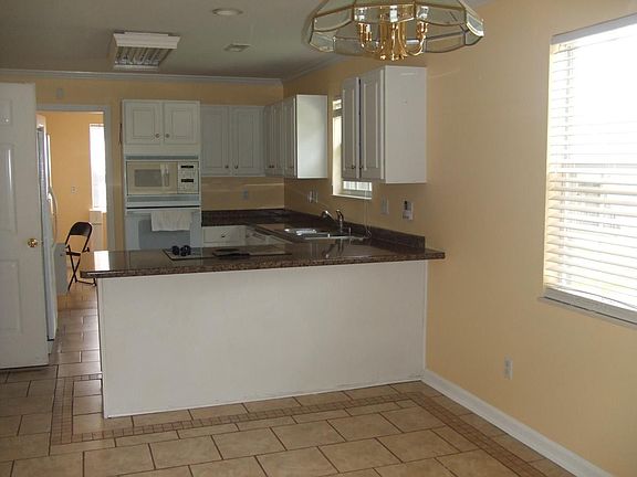 4th image of 8525 Lawnpark Dr
