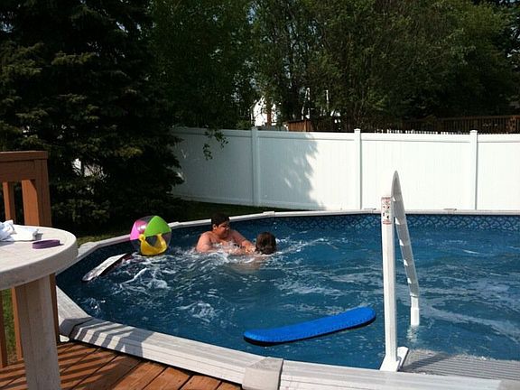 Swimming pool with slide