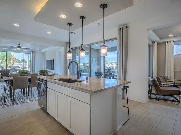 Fall in love with the seamless layout from the kitchen and cafe to the gathering room and den.