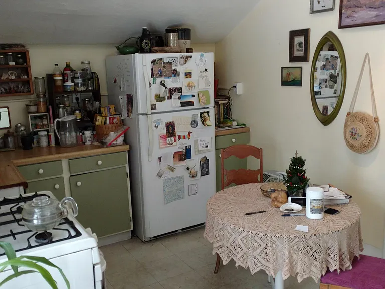 Kitchen looking Southwest. The door barely seen on the left is a pantry closet.