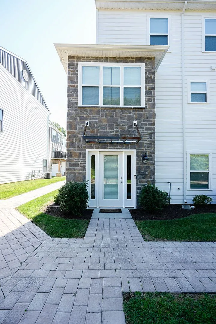 Refined Three-Level Townhome in High Pointe at Hershey — Photo 1