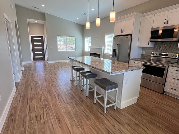Kitchen island seats five-six people