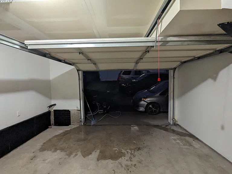 Garage to park your car, use as 4th bathroom or storage space